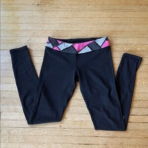 Used Condition Ivivva by Lululemon pink, white, and black waist band leggings